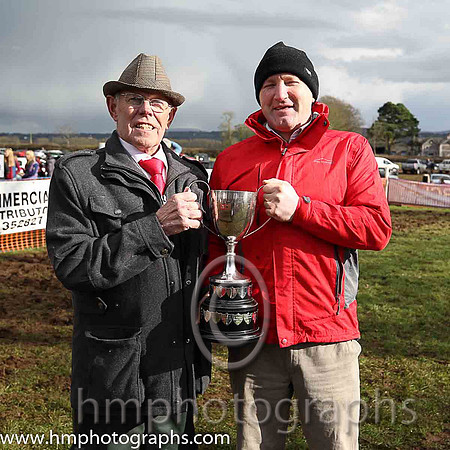 Bob McKnight Master of East antrim Hounds presents the Stirling Perpetual Challenge Cup to winning owner Peter Lawlor