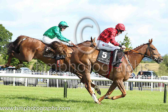 02nd Champ De Gane (FR) and M.M. McDonagh(7) (6 ,light green, dark green sleeves ), Trainer:S.R.B. Crawford , Owner:Simon Munir/Isaac Souede