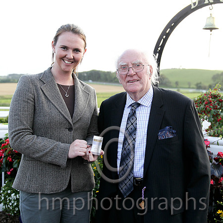 Ruth Black present Tommy Carson with a Diamond Ring which he won in a draw at Downpatrick