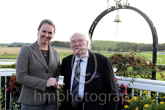 Ruth Black present Tommy Carson with a Diamond Ring which he won in a draw at Downpatrick