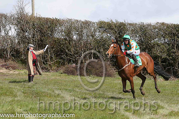 Franjie Fitzsimmons guides R james and Welsh's Castle around the final fence