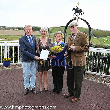 Presentation by Richard Lyttle Manager of Downatrick Racecourse and Pamela Ballantine to Gertrude and Aubrey Steele who were celebrating their 50th wedding anniversary
