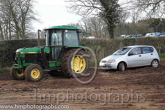 Car being towed out of the course at th East Antrim Hunt Point to Point at Loughanmore om Easter Tuesday