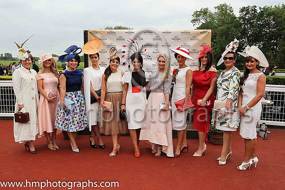 Kirsty Farrell from Newry (centre) winner of the Magners Forbidden Flavours Best Dressed Lady Competition on Magners Derby Day at Down Royal. The prize was a Las Vegas Five Day Five star Holiday.