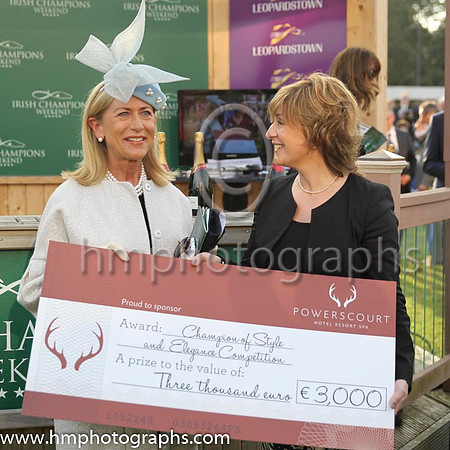 Liz Maher form Bagnellstown Co Carlow receives one of her prizes for winning the style and Elegance Competition at the Irish Champions Weekend at Leopardstown - a 5 star stay at the Powerscourt Hotel