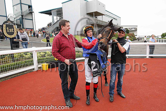 01st Lady Mega and Robbie Downey , trainer Edward Lynam winners of The Louis Roederer Handicap at Down Royal