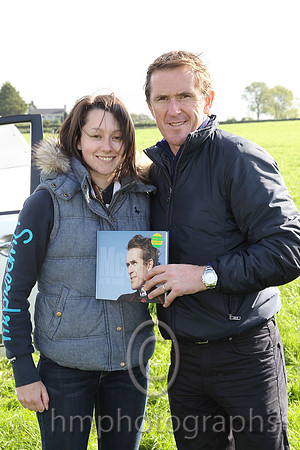 A young fan gets a book signed at Mid-antrim Hunt Point to Point at Moneyglass