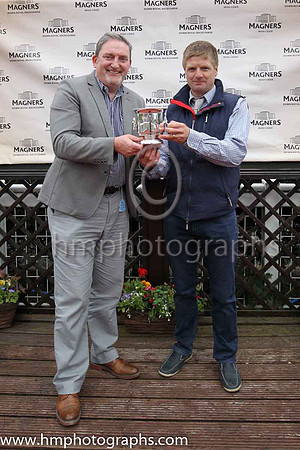 Terry McCourt of Magners present the trophy to JohnGriddin represebnting the owners after Stellar Mass and Kevin Manning, trainer J S Bolger won the Magners Ulster Derby of 100,000 Euro (Premier Handi