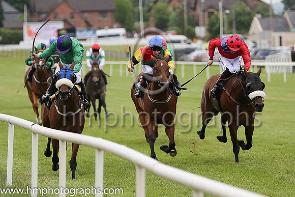 01st Forbear and Wayne Lordan (emerald green and purple and dark green cap) , trainer P Twomey win the Value Cabs Handicap at Down Royal