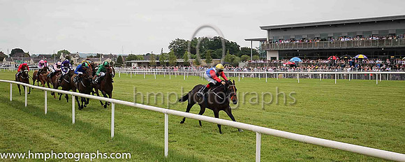 01st Lady Mega and Robbie Downey , trainer Edward Lynam winners of The Louis Roederer Handicap at Down Royal