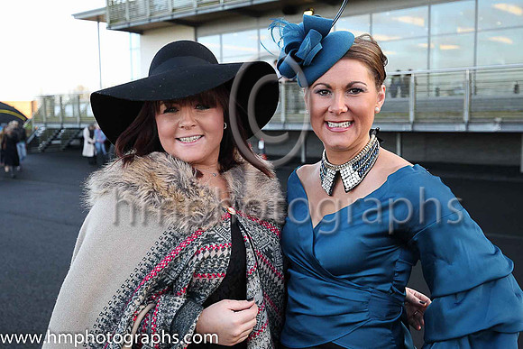 Jenny Montgomery and Deirdragh Murphy (clothes sponsored by Chic Fashions of Newry) at Down Royal on Boxing Day