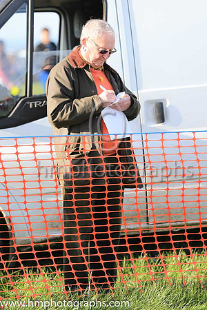 Marking the card at The Route Point to Point at Portrush