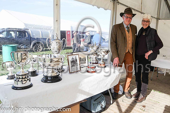 Hope Gardiner , Announcer and John Stewart Clerk of the Scales with the trophys at The Route Point to Pont at Portrush