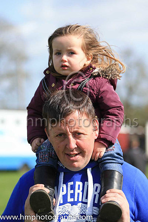 Two year old CJ O'Brien from Magheramourne gets an elevated view on her father's shoulders of the racing at the Loughanmore P2P