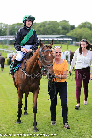 Joy Wilson leads in 01st Bell of The Ball  Rachael Blackmore (7, black, emerald green sash) Trainer Liam Lennon, Owner Liam Lennon