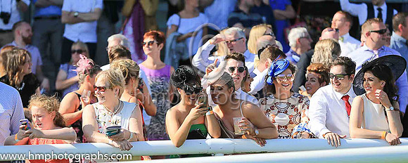 Spectators enjoy the craic at Downpatrick Racecourse