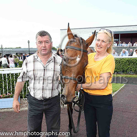 01st Bell of The Ball  Rachael Blackmore (7, black, emerald green sash) Trainer Liam Lennon, Owner Liam Lennon - Liam Lennon and Joy Wilson in picture