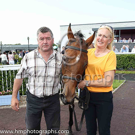 01st Bell of The Ball  Rachael Blackmore (7, black, emerald green sash) Trainer Liam Lennon, Owner Liam Lennon - Liam Lennon and Joy Wilson in picture