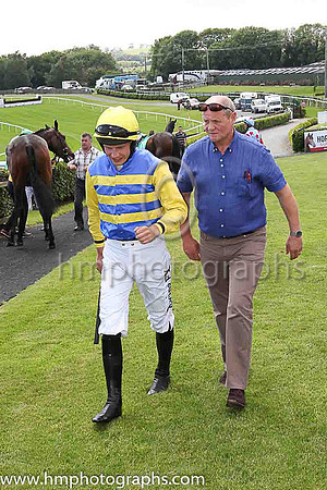 Trainer Colin McBratney and jockey Paul Townend of 2nd place Caerleon Kate in the parade ring