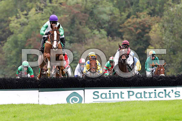 Miss Macauley ( Purple Cap) , Jockey Mr B T O'Connell - 13th in the lead - Lets Go sunshine , Jockey Mr B O'Neill - winner in centre in Yellow and Blue Spots - FT8E4044-e