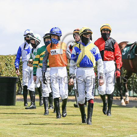 Jockeys enter the parade ring at Downpatrick on 7/5/21