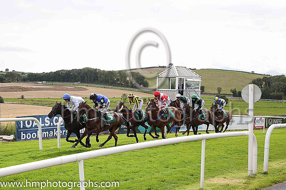 Crossing the line for the first circuit 01st Sharlanda and S W Flanagan ( 3 , red, white chevron ) Trainer - C Bowe , Owner - Thomas F Hughes
