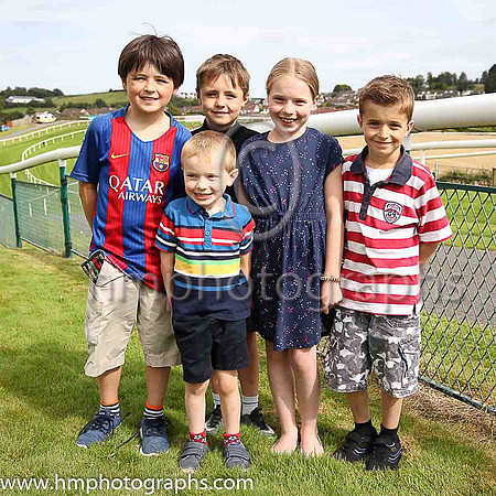 Leo Fennell, Fionn Fennell, Emer Hanna and Caollfhionn Hanna and Louhlainn Hanna in front enjoying themselves at the Keep It Country Raceday and Concert at Downpatrick Races