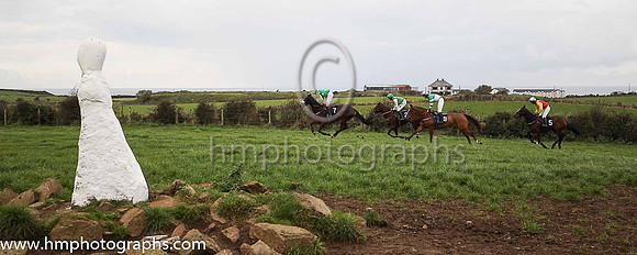 Maddy, Frankie and Gracie McNally enjoy their lollypops at The Route Point-To-Point Steeplechases at Portrush