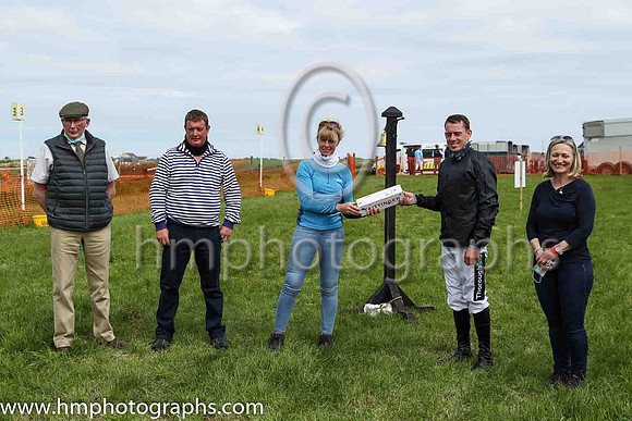 Lesley Jones, Master of the North Down Hunt Club presenting a gift to Barry O'Neill to recognise his success in becoming the leading point to point rider in Ireland in the current season. <br/>He also