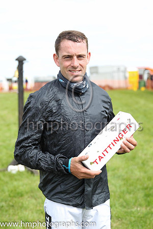 Barry O'Neill with a gift form the North Down Hunt to recognise his success in becoming the leading point to point rider in Ireland in the current season. <br/>He also was the leading rider in the fou