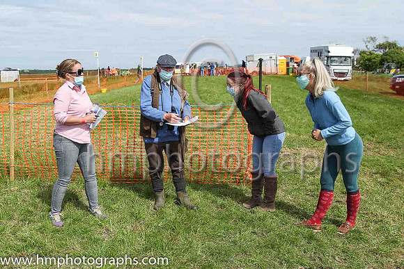 Turf Club official Frankie Fitzsimmons in discussion with fence stewards Kim Dunn, Bailey Dunn and Rebecca Keery at North Down Hunt Club Point to Point Steeplechases at Kirkistown