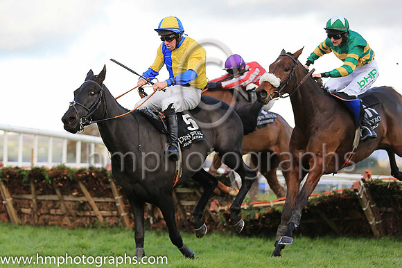 Charlie Stout (5) and Patrick Corbet lead eventual winner Top Othe Ra and Paul Townend (red and white) and Crossed My Mind and Rachael Blackmore over the last at Down Royal