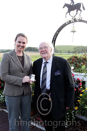 Ruth Black present Tommy Carson with a Diamond Ring which he won in a draw at Downpatrick