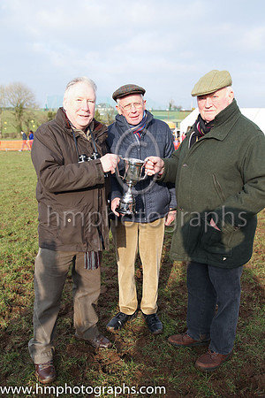 Sam Campell from Dromara, Ken Stitt from Spa and Fred Mackie from Dromare - of Carnglave Racing owners of Clondaw Frisby with the Leeman Cup after winning the Armagh Construction sponsored Open Lightw