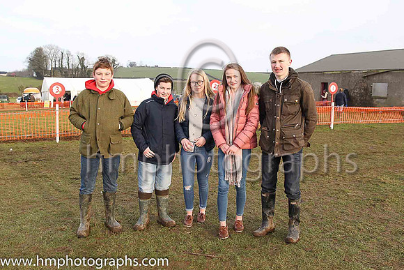 Spectators at the Tynan and Armagh Hunt Point to Point Races - John Anthony Leigh Livingstone, Zack McCall (Fence Steward), Penny Wright, Julie Hamilton, and Samuel Phillips (Fence Steward)