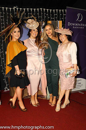 Sisters Clare Murnin (finalist in the WKD Most appropiately dressed lady competion), Laura Brennan, Michael McAvoy with their mum Winnie McAvoy from Newcastle at Downpatrick Races