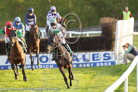 Pat Healy capturing the action at Downpatrick Racecourse