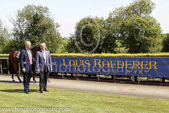 Mark Bingley of Louis Roederer and Jim Nicholson Chairman of the Committee of Freeman of Down Royal on Magners Derby Day at Down Royal