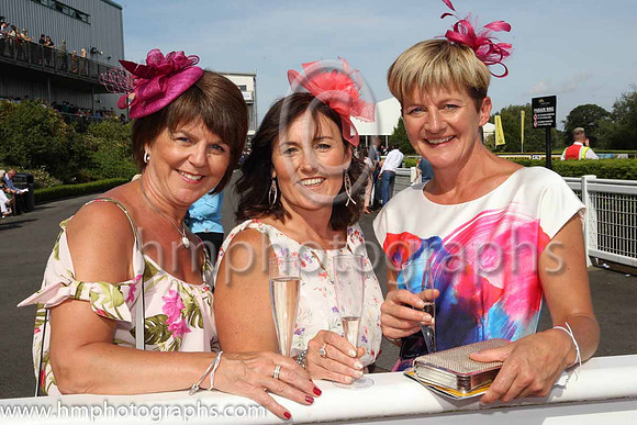 Paula McStay, Eileen McAlinden and Leeanne McCusker from Derrytrasna near Lurgan enjoying themselves at the Magners Ulster Derby Day at Down Royal