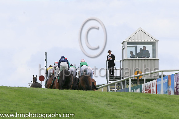 Horses and Riders pass the Stewards at Downpatrick Races on 12th June 2022