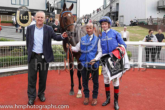 Joe Osborne, representing owners Godolphin, Twilight Payment, stable lad Tommy O'Leary and jockey Kevin Manning in the parade ring at Down Royal after winning Her Majesty's Plate Stakes (Listed Race)