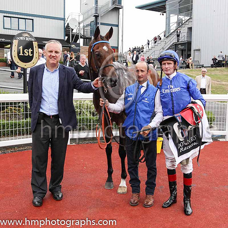 Joe Osborne, representing owners Godolphin, Twilight Payment, stable lad Tommy O'Leary and jockey Kevin Manning in the parade ring at Down Royal after winning Her Majesty's Plate Stakes (Listed Race)