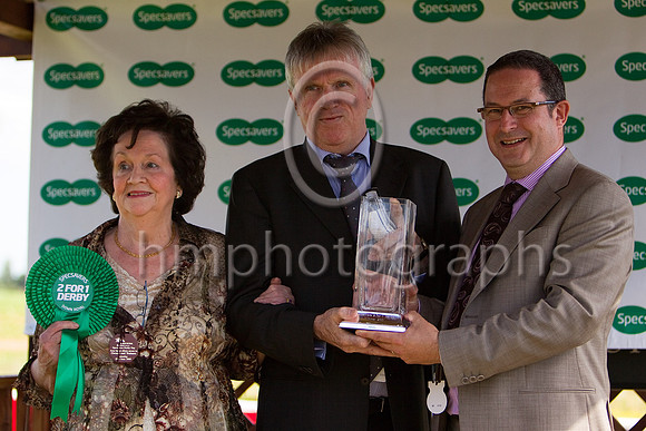 Celtic Dane wins the Specsavers 2 for 1 Derby at Down Royal - Specsavers Ann Street store direstor David Maguire presents the trophy to David Bennan son of the Owner Eileen Brennan - CU2D0309-e3a4j