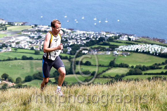 Joe McAlister of St Malachy's on the summit of Lurig, 1st in 28.50 - FT8E3252-e2