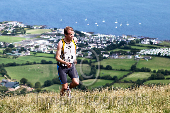 Joe McAlister of St Malachy's on the summit of Lurig, 1st in 28.50 - FT8E3251-e2