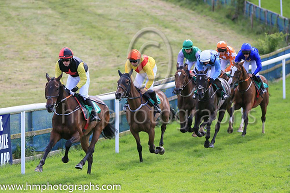 Lieutenant Highway(3, Black Red Star, Yellow Sleeces) ridden by Corey McGivern in the lead before goung on the win Race 5 at Downpatrick Races on 12th June 2022