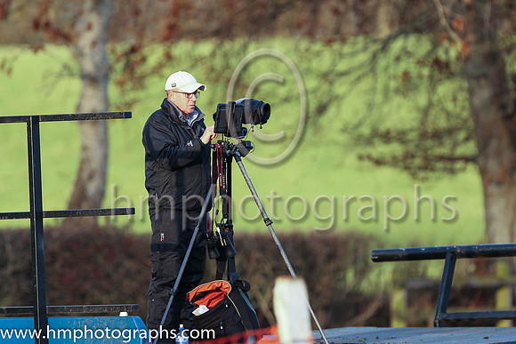 Cameraman amongst the autumn coloured trees