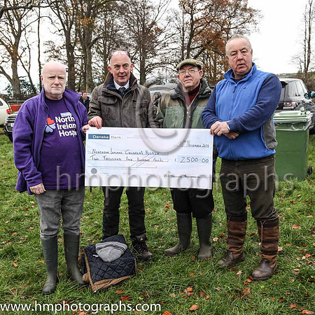 Frank Agnew of the Antrim branch of the Northern Ireland Hospice receoves a cheque for £2,500 from officials of The Northern Ireland On Course Bookmakers - Tommy Donnelly Secretary, Billy Savage