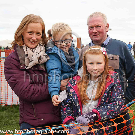 Judith Moorhead and children Jack and Rachel with grandfather Trevor Moorhead at the Route Point-To-Point Steeplechases at Portrush
