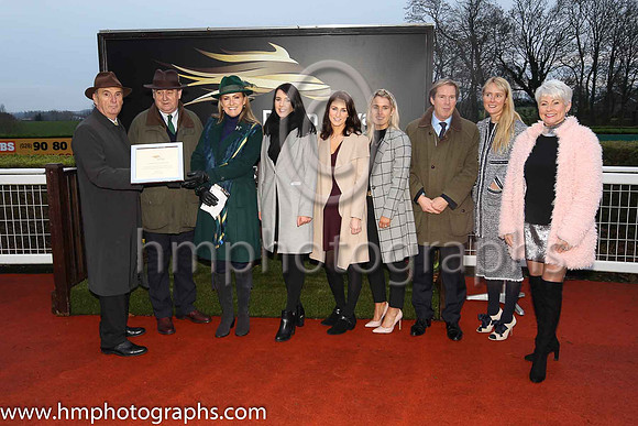 Jim Nicholson, Chairman of the Corporation of Horse Breeders, Noel Meade and his wife Derville, and Down Royal staff; Caroline Todd, Susan McCartney, Leah Beattie, Mike Todd Manager , Molly McCloskey